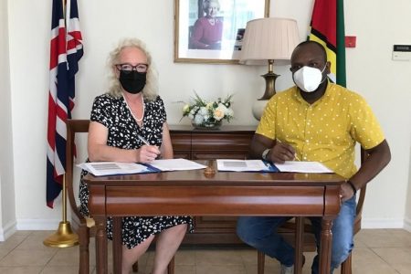 High Commissioner Jane Miller (left) and Permanent Secretary of the Ministry of Health  Malcolm Watkins signed the bilateral agreement.  (British High Commission photo)
