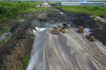 Works progressing on the Eccles to Mandela Avenue four-lane highway. This road is expected to significantly ease the traffic congestion on the East Bank of Demerara. (Screenshot from Office of the President video)
