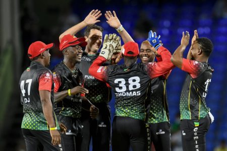 Members of the St. Kitts and Nevis Patriots celebrating their win over Barbados Royals on the
opening night of the Hero Caribbean Premier League (CPL) in Basseterre, St Kitts and Nevis (CPL)