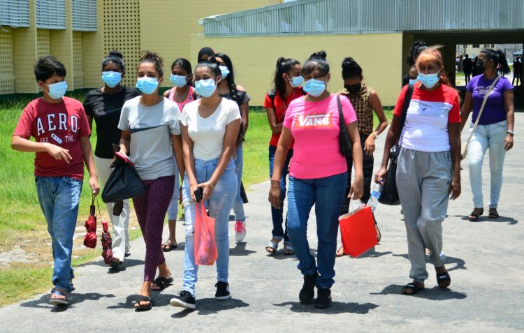 Parents and children at the Bladen Hall Multilateral School yesterday. (Orlando Charles photo)