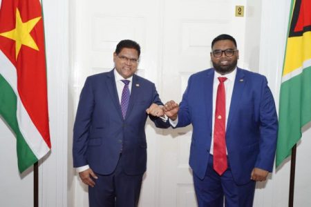 President Irfaan Ali with Suriname President Chandrikapersad Santokh 