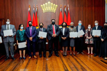 President Irfaan Ali (seventh, from left) with the newly-sworn in members of the Law Reform Commission and other officials, including acting Chancellor Yonette Cummings-Edwards, Minister of Parliamentary Affairs Gail Teixeira and Guyana Bar Association (GBA) President Pauline Chase