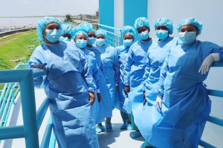 Staff of the Infectious Disease Hospital at Liliendaal, East Coast Demerara dressed in their personal protective gear 