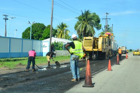 Maintenance road work being done in the vicinity of the Infectious Disease Hospital at Liliendaal, along the Rupert Craig Highway, East Coast Demerara (Orlando Charles photo)