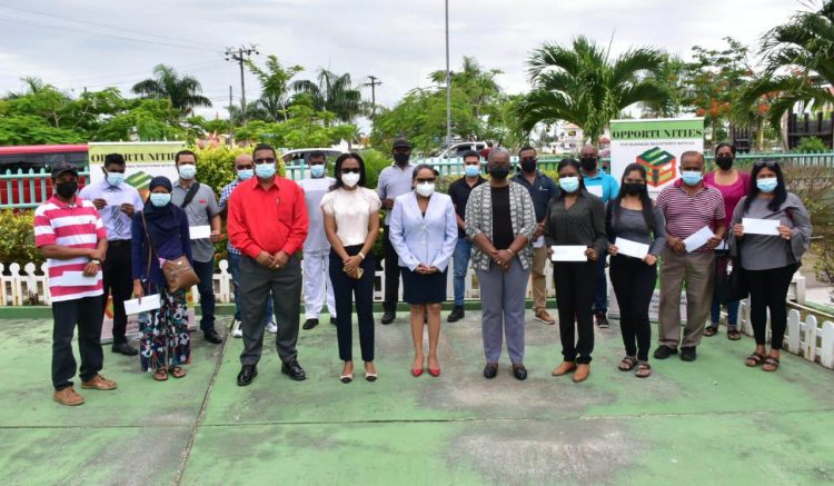 All the beneficiaries of the grants with the Minister of Tourism Industry and Commerce Oneidge Walrond, SBB Chief Executive Officer Vanessa Thompson and other officials