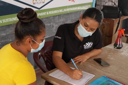 A participant with a facilitator during one of the previous camps
