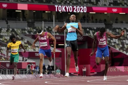 Steven Gardiner of the Bahamas on course to win the gold medal in the Men's
400m Final on day thirteen of the Tokyo 2020 Olympic Games at Olympic Stadium