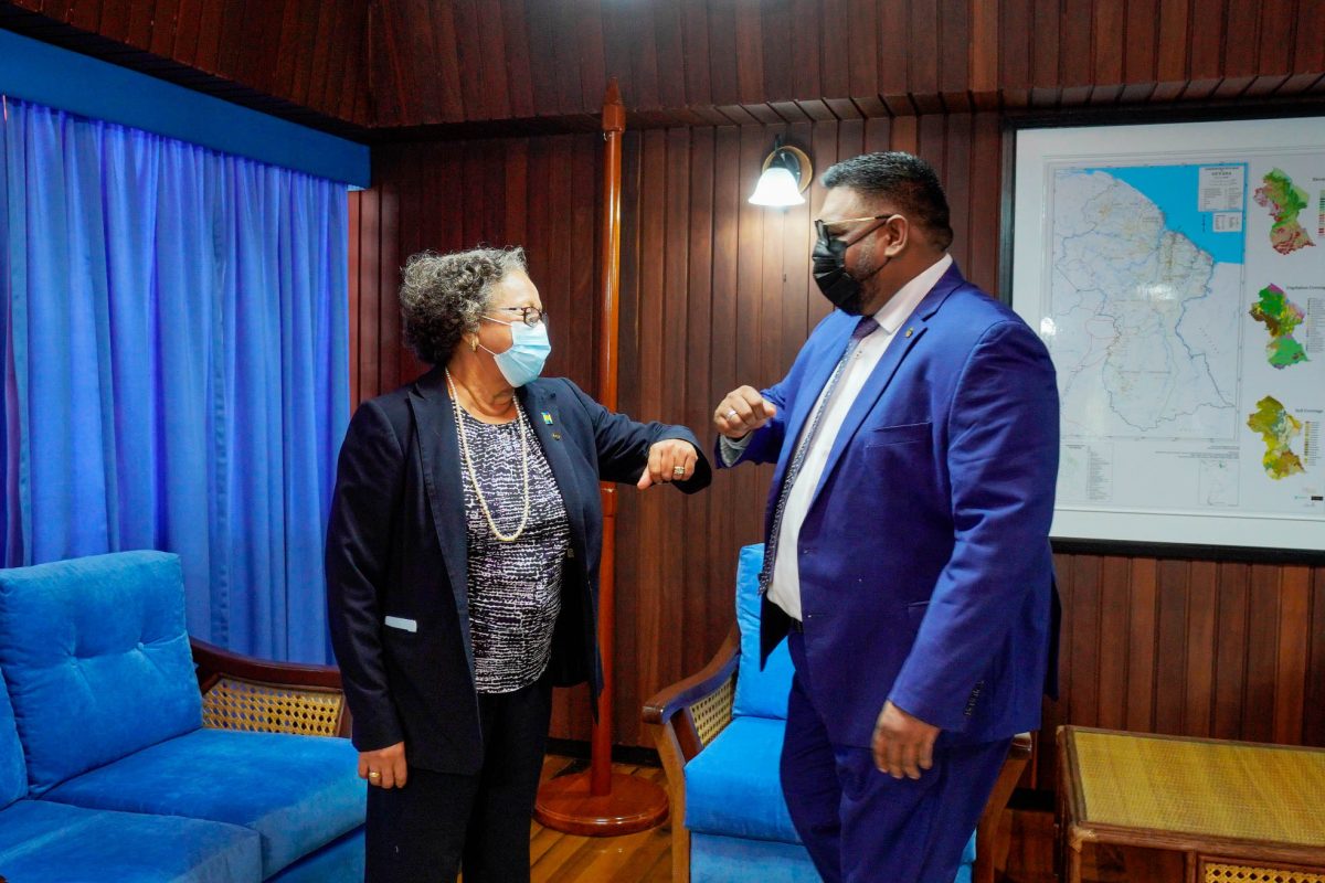 President Irfaan Ali (right) greeting new CARICOM Secretary General Dr Carla Barnett