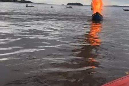The boat on fire in the Essequibo River

