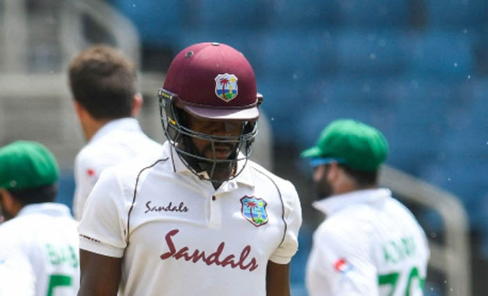 Batsman Kyle Mayers walks off after falling for 32 on Tuesday’s final day of the second Test at Sabina Park.