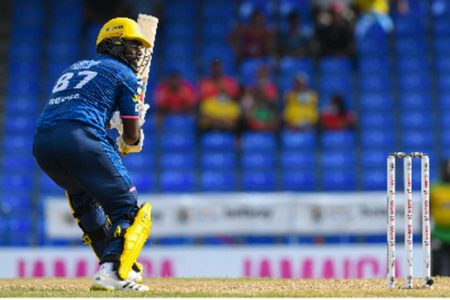 Raymon Reifer gathers runs during his knock against Jamaica Tallawahs on Saturday. 