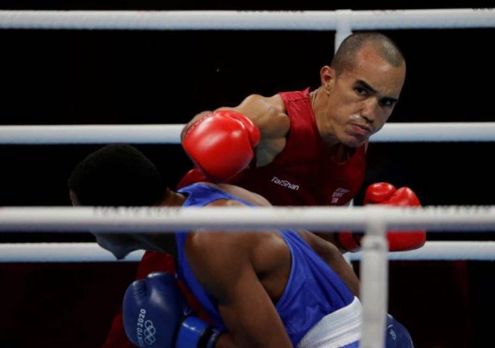 Eldric Sella Rodriguez of the Refugee Olympic Team in action against Euri Cedeno Martinez of the Dominican Republic REUTERS/Ueslei Marcelino/File Photo.