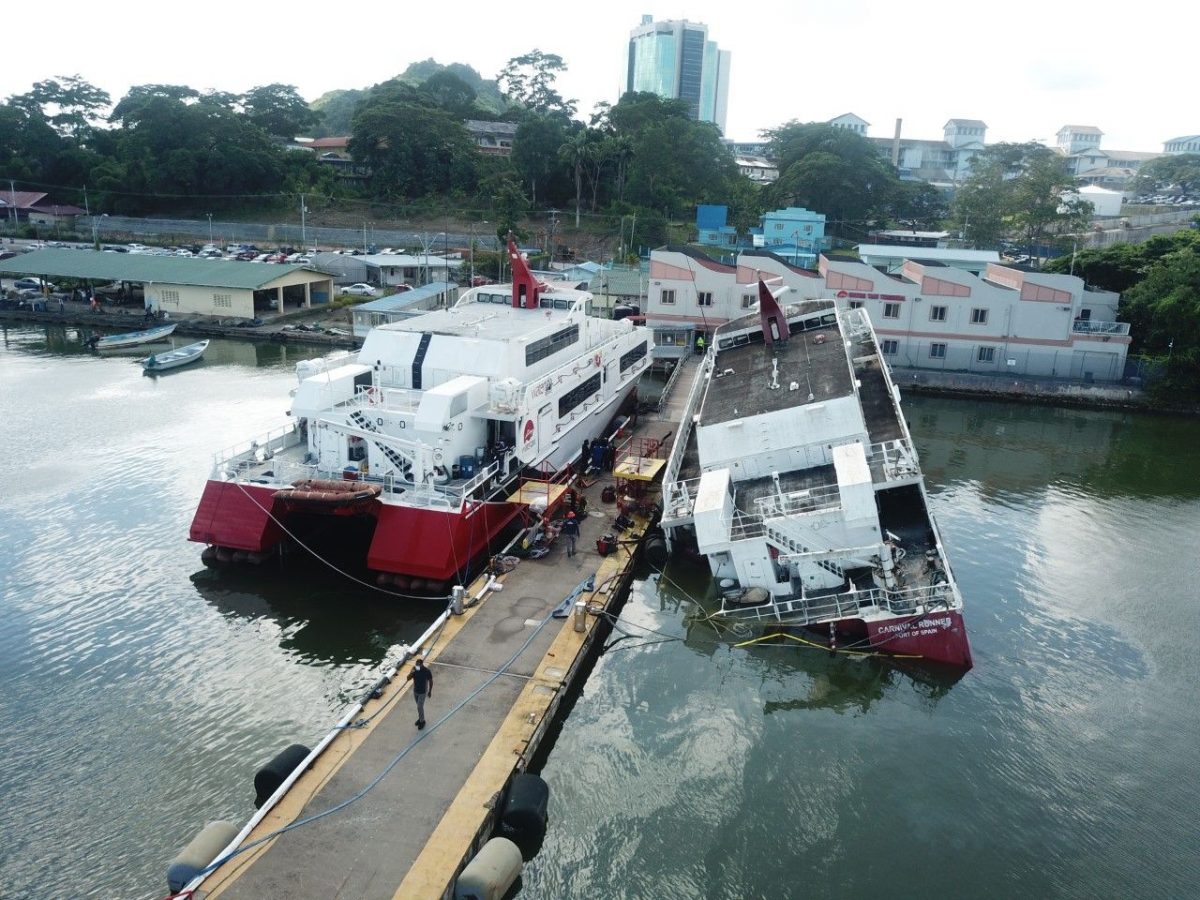 The sinking Carnival Runner Water Taxi at Kings Wharf in San Fernando, yesterday.