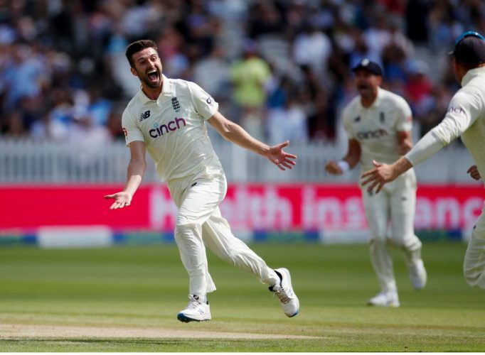 England’s Mark Wood celebrates after taking the wicket of India’s Rohit Sharma (not in picture) Action Images via Reuters/Paul Childs
