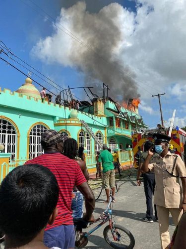 The masjid in flames (Photo credit Reaz Hassan Facebook page) 