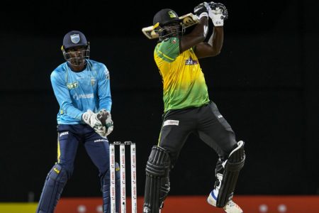 Kennar Lewis of Jamaica Tallawahs on the assault against St. Lucia Kings in the CPL at Warner Park, St Kitts.
