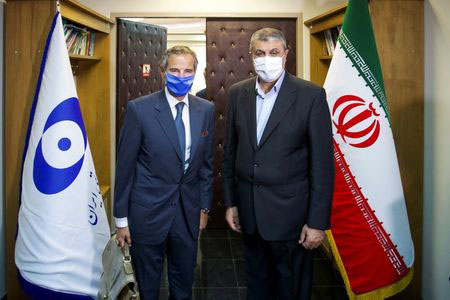 International Atomic Energy Agency (IAEA) Director General Rafael Grossi meets with head of Iran's Atomic Energy Organization Mohammad Eslami, in Tehran, Iran, September 12, 2021. WANA (West Asia News Agency) via REUTERS