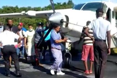 A screenshot of persons pushing the aircraft off the runway yesterday
