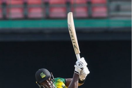 Carlos Brathwaite of the Jamaica Tallawahs hits a six to bring up his half century yesterday against the Trinbago Knight Riders at Warner Park, Sporting Complex, Basseterre, St Kitts. (Photo by Randy Brooks-CPLT20/Getty Images)
