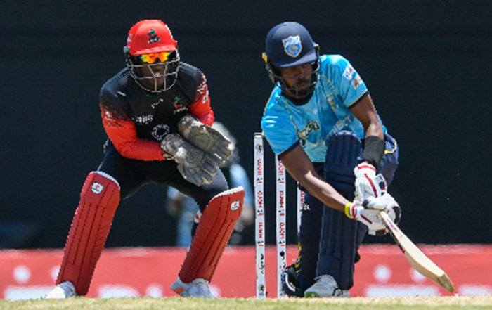 Roston Chase sweeps during his unbeaten half-century for St Lucia Kings yesterday. (Photo courtesy CPL Media) 