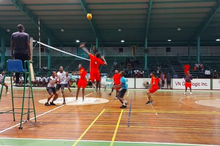 Action between Eagles and Young Achievers (orange) at the Cliff Anderson Sports Hall in game 1 of the three match final series in the DVA ‘A’ division league.