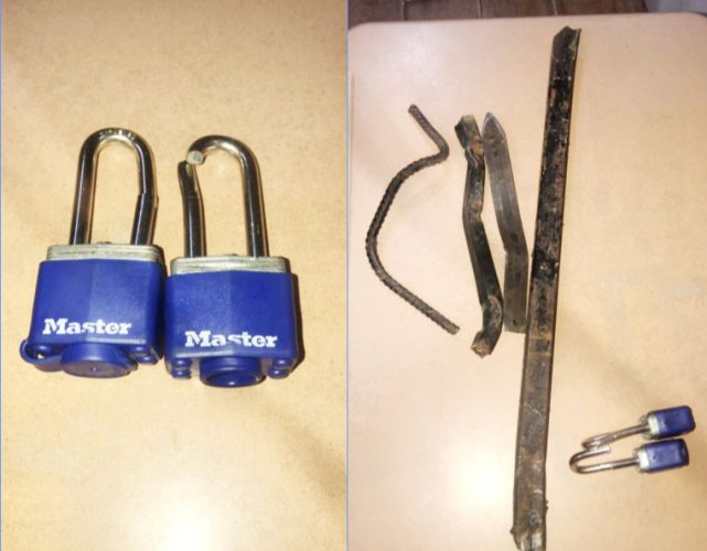 The broken padlocks and steel rods that were found at the scene. 