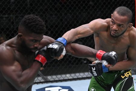 Carlston Harris (right) of Guyana unloads a right hand on American Impa Kasanganay enroute to his first round stoppage victory on the preliminary card of the Fight Night: Stann vs Smith event at the UFC Apex facility, Las Vegas, Nevada.