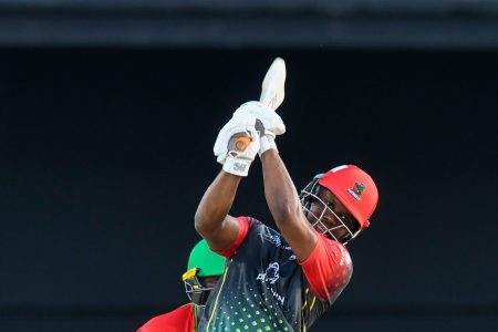 Evin Lewis hits out during his unbeaten half-century in the second semi-final against Guyana Amazon Warriors yesterday. (Photo courtesy CPL Media) 