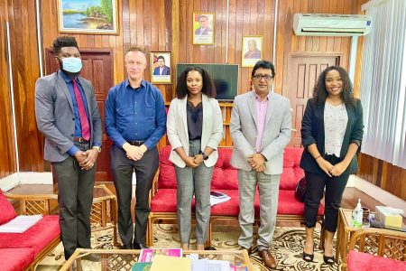 Attorney General Anil Nandlall (second from right) with from left: Chevy Devonish, Chevy Devonish, State Counsel of the Attorney General Chambers; Jason Reichelt, Crime and Prevention Office at UNODC; Joanna Bond, Deputy Chief Parliamentary Counsel and Bo Shakira Harris, Associate Programme Management Officer, UNODC.