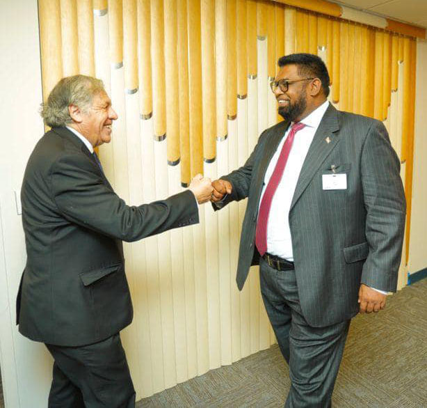 President Irfaan Ali (right) greeting OAS Secretary General Luis Almagro yesterday (Office of the President photo)