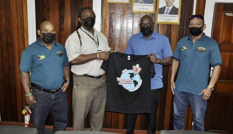 Secretary of the GAPLF, Roger Rogers (2nd left) presents the official competition jersey to DoS Steve Ninvalle in the presence of Andrew Austin (left) and Mark Seymour.