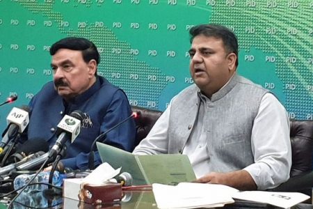 Pakistan Information Minister Fawad Chaudhry, along with Interior Minister Sheikh Rasheed Ahmad, addresses a news conference in Islamabad, Pakistan yesterday. REUTERS/Salahuddin.