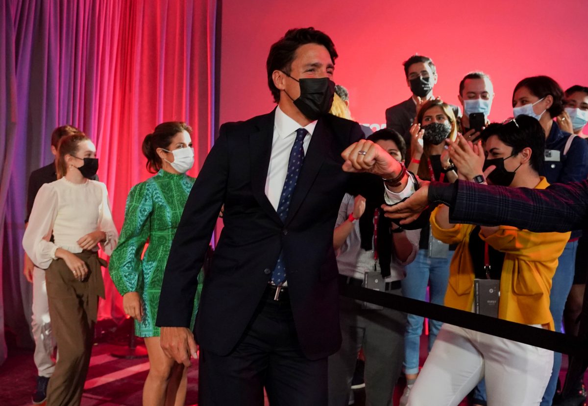 Canada's Liberal Prime Minister Justin Trudeau greets supporters during the Liberal election night party in Montreal, Quebec, Canada, September 21, 2021. REUTERS/Carlos Osorio