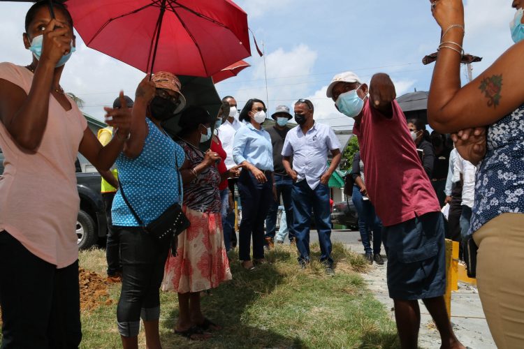 Housing Minister Susan Rodrigues and team engaging residents at D’Edward