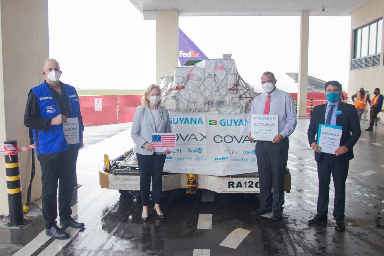 From left are PAHO/WHO Representative to Guyana Dr. Luis Codina, US Ambassador Sarah-Ann Lynch, Minister of Health Dr. Frank Anthony and UNICEF Deputy Representative to Guyana and Suriname Irfan Akhtar, who were all present as more Pfizer vaccines arrived yesterday at the Cheddi Jagan International Airport (Ministry of Health photo)