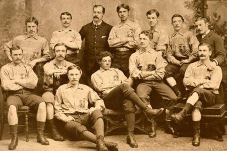  Watson (front centre, with legs crossed) pictured with the Scotland team that beat England 6-1 in 1881