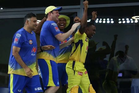 Dwayne Bravo of Chennai Super Kings and staff celebrate their team’s win in  qualifier 1 match of the Vivo Indian Premier League against the Delhi Capitals at the Dubai International Stadium in the United Arab Emirates yesterday.Photo by Arjun Singh / Sportzpics for IPL