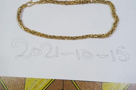 A chain that was recovered from the suspect (Police photo) 