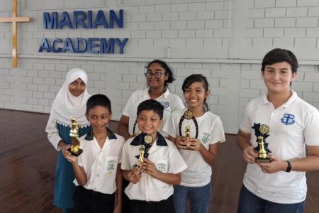Young chess players with their prizes after a tournament
