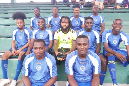 The starting XI for Pouderoyen FC before their clash with Den Amstel at the Nation Track and Field Centre, Leonora yesterday
