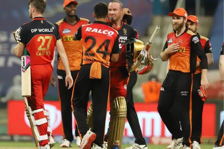 Sunrisers Hyderabad players, including West Indies all-rounder Jason Holder (second from left), celebrating beating Royal Challengers Bangalore in the Indian Premier League yesterday in Abu Dhabi. (IPL photo) 