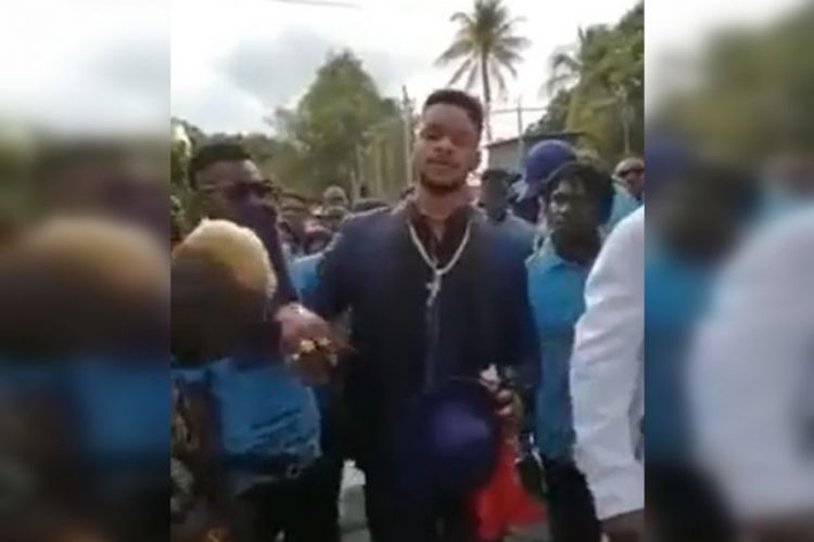 The man speaking in the video, dressed in a purple suit, is identifiable as the man known in Haiti by the alias Lamo Sanjou, the leader of the 400 Mawozo gang.SCREENSHOT: TWITTER