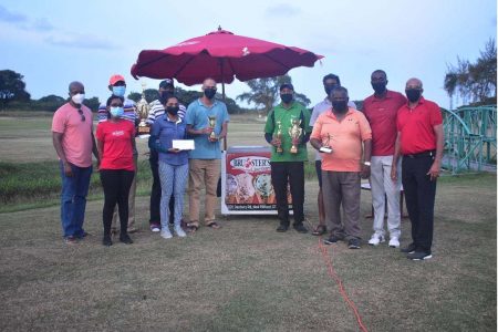 Golfers and representatives of the sponsor at the end of the tournament. From left to right; Selwin George, Sharon Khan, Maxim `Danny’ Mangra, Troy Cadogan, Joann Deo, Andre Cummings, Jeetendra Dhanpat, Roy Dhori, Mike Guyadin, Paton George and Patanjali Persaud.