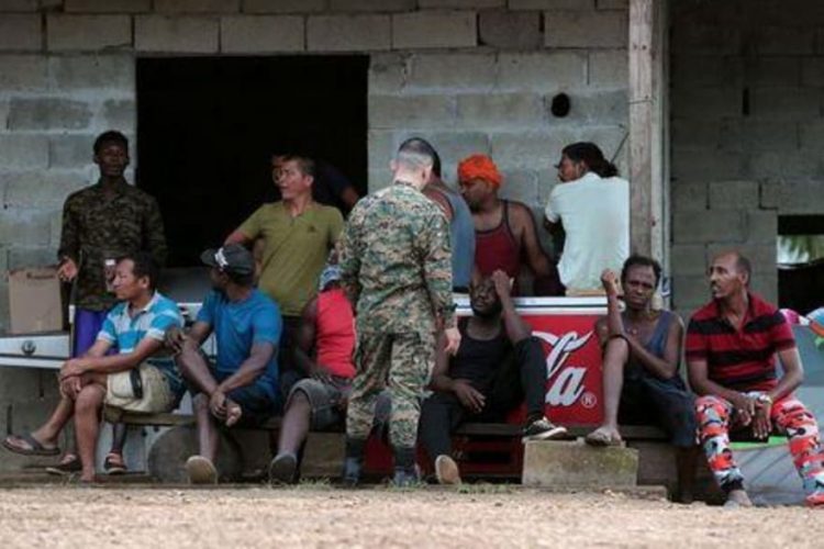 Migrants are seen at temporary shelter during acting U.S. Secretary of Homeland Security Kevin McAleenan's visit in the village of La Penita, Panama August 23, 2019. REUTERS/Erick Marciscano