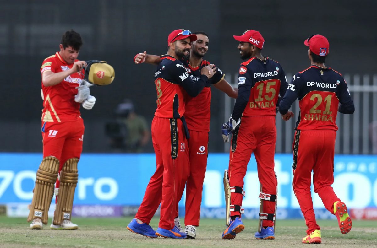 Royal Challengers Bangalore beat Punjab Kings by six runs to qualify for the Playoffs.
