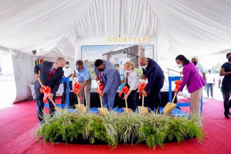 President Irfaan Ali (third from left) was joined by US Ambassador Sarah-Ann Lynch (third from right), Public Works Minister Juan Edghill (second from right), Minister of Tourism and Industry Oneidge Walrond (at right), Roy Bassoo (second from left) and an official from the Marriott chain in turning the sod for the Marriott-branded hotel at Timehri on July 2nd. (Office of the President photo)