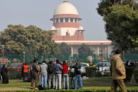 FILE PHOTO: Television journalists are seen outside the premises of the Supreme Court in New Delhi, India, January 22, 2020. REUTERS/Anushree Fadnavis/File Photo