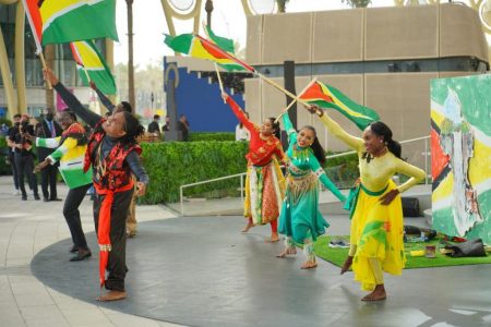 Vibrant: Singers and dancers  put on an energetic display in Dubai, United Arab Emirates  yesterday at the World Expo where Guyana was showcased. (Office of the President photo)