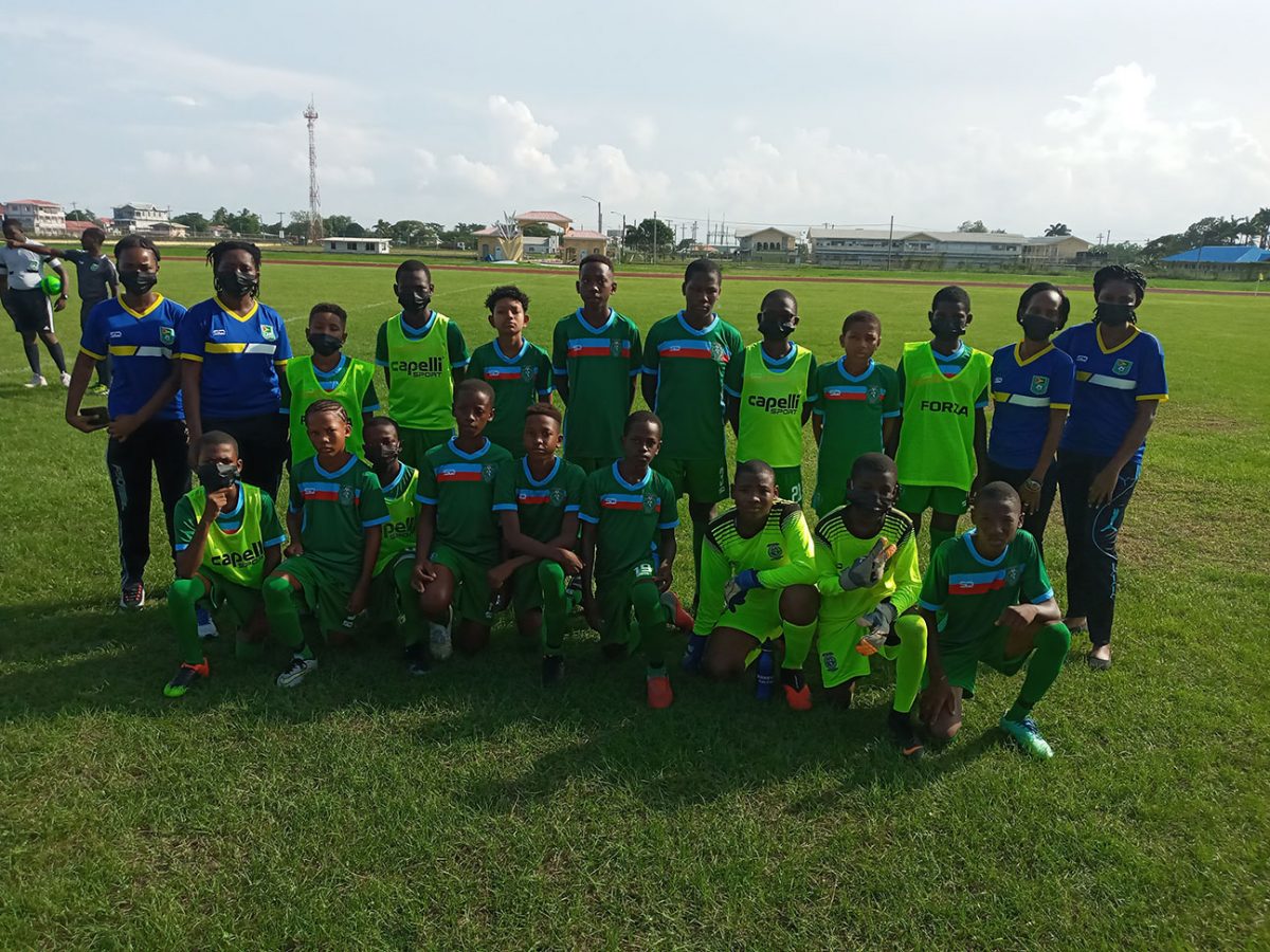 The Starting XI and management team for West Demerara