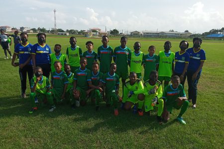 The Starting XI and management team for West Demerara